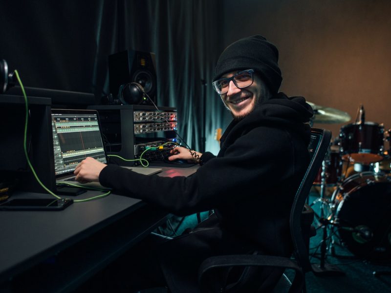 a-sound-engineer-uses-a-mixing-board-and-software-to-create-audio-track-.jpg