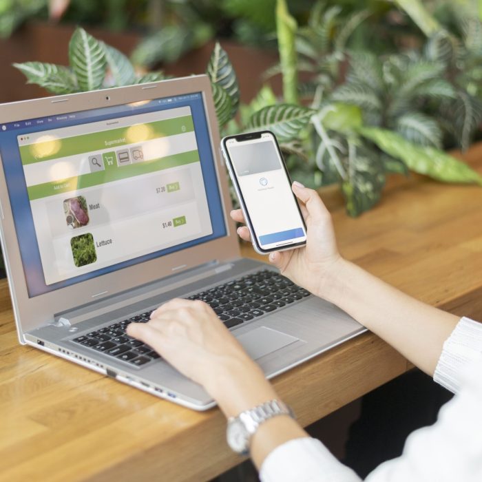 person-paying-with-its-smartphone-wallet-app-min